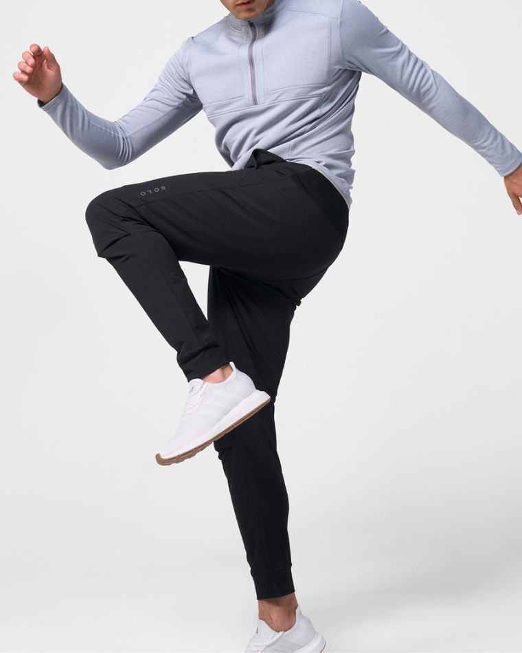 OROS product photography after — full figure, mid-stride